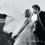 grayscale shot of bride and groom