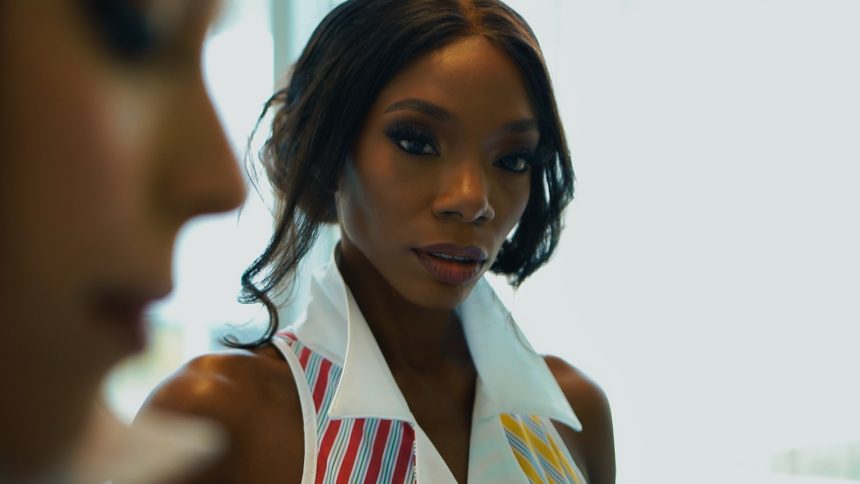 a woman with a tie around her neck