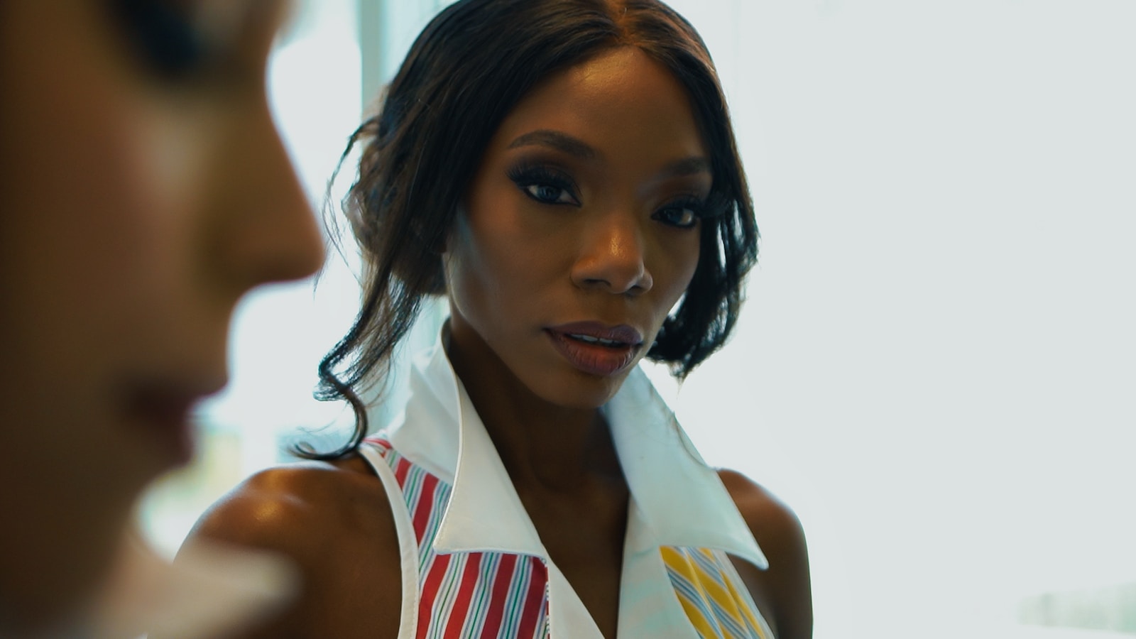 a woman with a tie around her neck